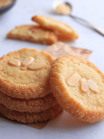 These Marzipan Butter Cookies are rich with crisp edges and a chewy center. Packed with almond flavor and finished with sugar-coated edges, theyβre elegant and easy to make with either homemade or store-bought marzipan.